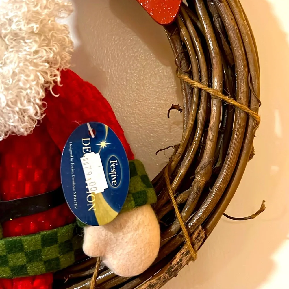 Festive. Merry Christmas. Sitting Santa Claus on the Wooden Bench.